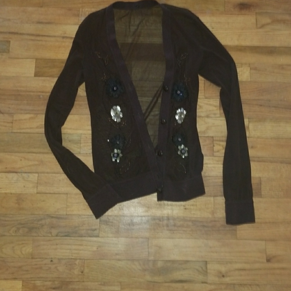 Shear button up top with beautiful flower detailin